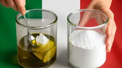 Bicchieri con burro, olio e zucchero sulla bandiera italiana in cucina.